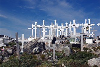 Wooden crosses in barren landscape