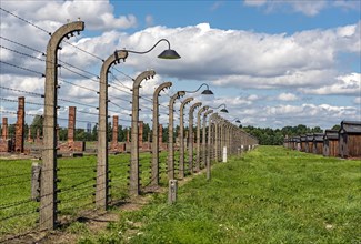 Barbed-wire fence and lamp-post at Auschwitz II-Birkenau concentration camp