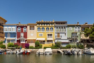 Yachts and colorful houses