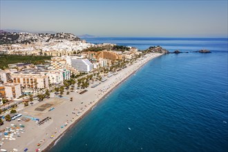 Aerial view of touristic coast in Almunecar by Mediterranean Sea