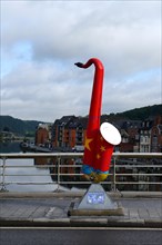 Colourful saxophone in memory of Adolphe Sax on the Pont du Charles de Gaulle