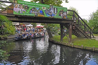 Tourists in Spreewald barges in the village of Lehde