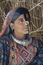 Dhaneta jat woman wearing the Nathli gold nose ring