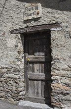 Old door with Occitan inscription