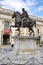 Side view of bronze replica of historical equestrian statue of Marcus Aurelius