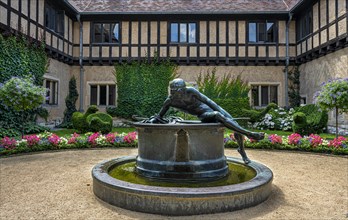 The Narcissus Fountain in the garden of Cecilienhof Palace in Potsdam