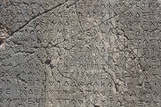 Macro view of the writing on the inscription column in the ancient city of Xanthos