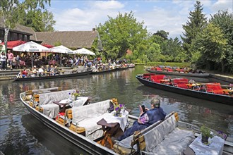 Tourists in Spreewald barges in the village of Lehde