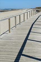Wooden walkway on the beach Costa Nova