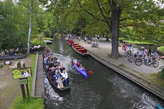 Tourists in Spreewald barges in the village of Lehde
