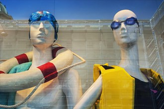 Mannequins with swimming utensils