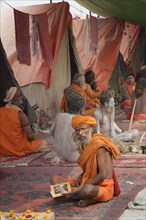 Sadhus in front of a tent