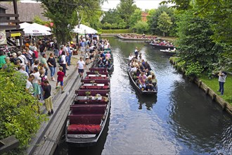 Tourists in Spreewald barges in the village of Lehde