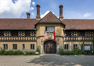 Flags at the main entrance to Cecilienhof Palace in Potsdam
