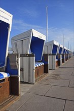 Endless row of beach chairs on the beach promenade of Westerland