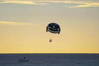 Paragliding in the sunset