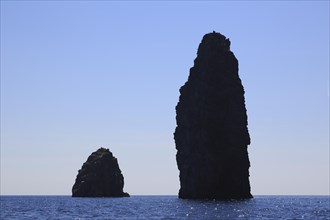 Rocks jutting out of the sea Faraglioni di Lipari at the southern tip of Lipari