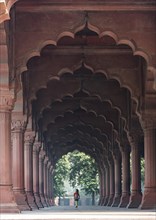 Girl under the arcade of the Diwan-i-Aam (Hall of Public Audience)