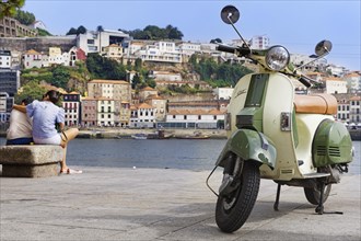 Scooter at the riverside of the Douro