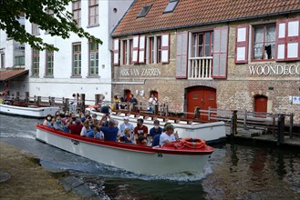 Excursion boats on a canal in Bruges