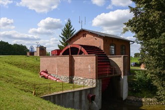 Engine house with water wheel to drive the cable drum