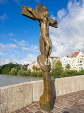 Christ statue by artist Rudi Wach on the Innsbruck Inn Bridge