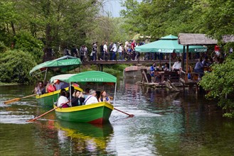 Boats and restaurants in the headwaters of Lake Ohrid