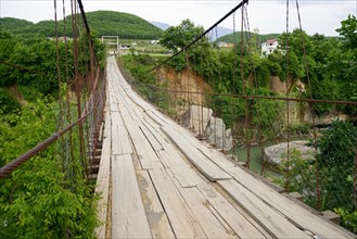Suspension bridge at Suc over the river Mat