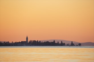 Church and harbour of Romanshorn in the evening light