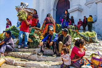 Picturesque rituals and flower offerings on the steps of Santo Tomas