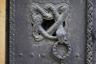 Snake on entrance door to St. Mary's Cathedral