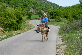 Woman on a donkey