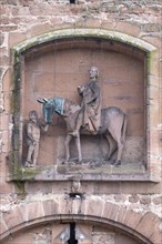 St. Martin's Gate with depiction of St. Martin sharing his coat on a horse