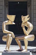 Sculpture La Conversation by Etienne in front of Lonja del Comercio Building