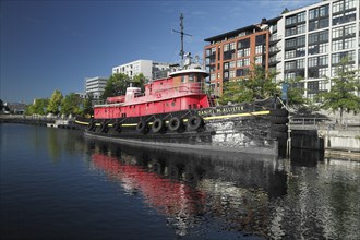 Tugboat in the Pold port