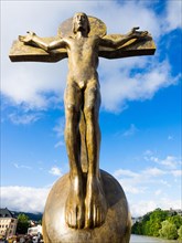 Christ statue by artist Rudi Wach on the Innsbruck Inn Bridge