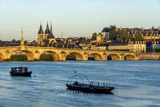 View on bridge Jacques Gabriel and the town of Blois at sunrise