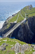 Steep cliffs with suspension bridge