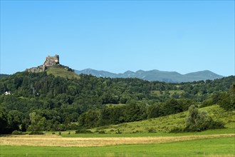Castle of Murol and view on Sancy massif in Auvergne Volcanoes Natural Park
