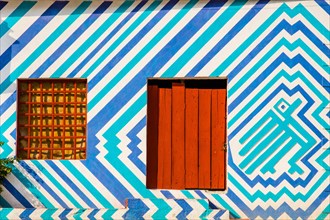 Houses painted with traditional Mayan patterns