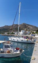 Sailboats in the harbour of Livadia on Tilos Island