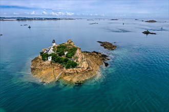 Drone shot of Ile Louet with the lighthouse and the countless small islands off the coast