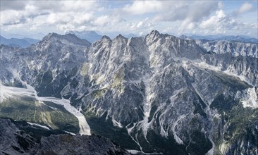 Hiker with helmet looking at mountains