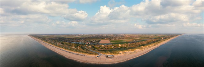 Large panoramic drone shot of the coast in front of Julianadorp aan Zee with a view of the beach