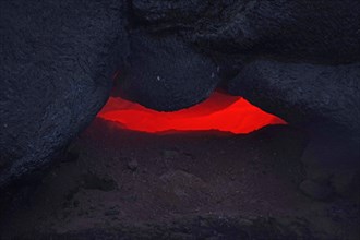 Magma glows under cooled lava