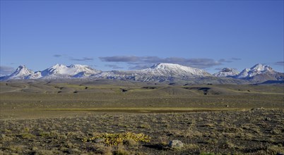 View to the snow-covered mountains of Kerlingarfjoell