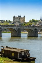 The Cessart bridge and Chateau de Saumur on river Loire