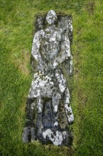 Stone grave slab of Angus Martin on the Kilmuir Cemetery