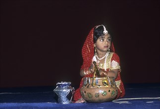 A girl in costumes in a religious festival of Krishna Janmashtami