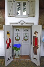 Artfully designed entrance to an old Frisian house
